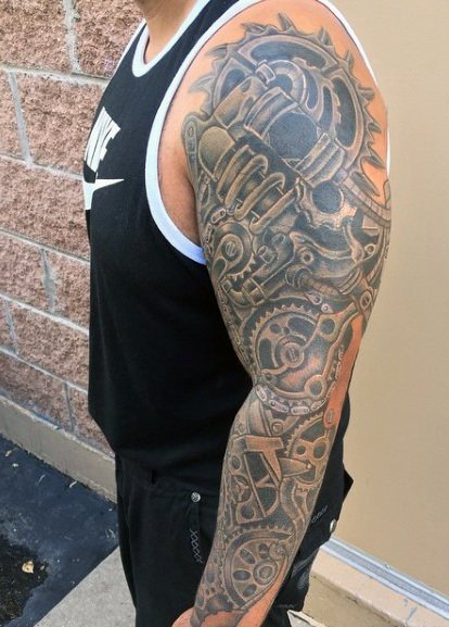 让人感觉无比有力的男性生物机械花臂纹身图案