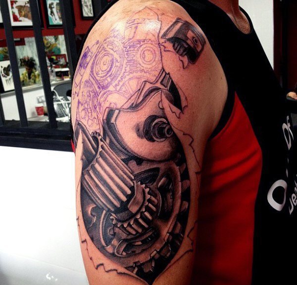 让人感觉无比有力的男性生物机械花臂纹身图案