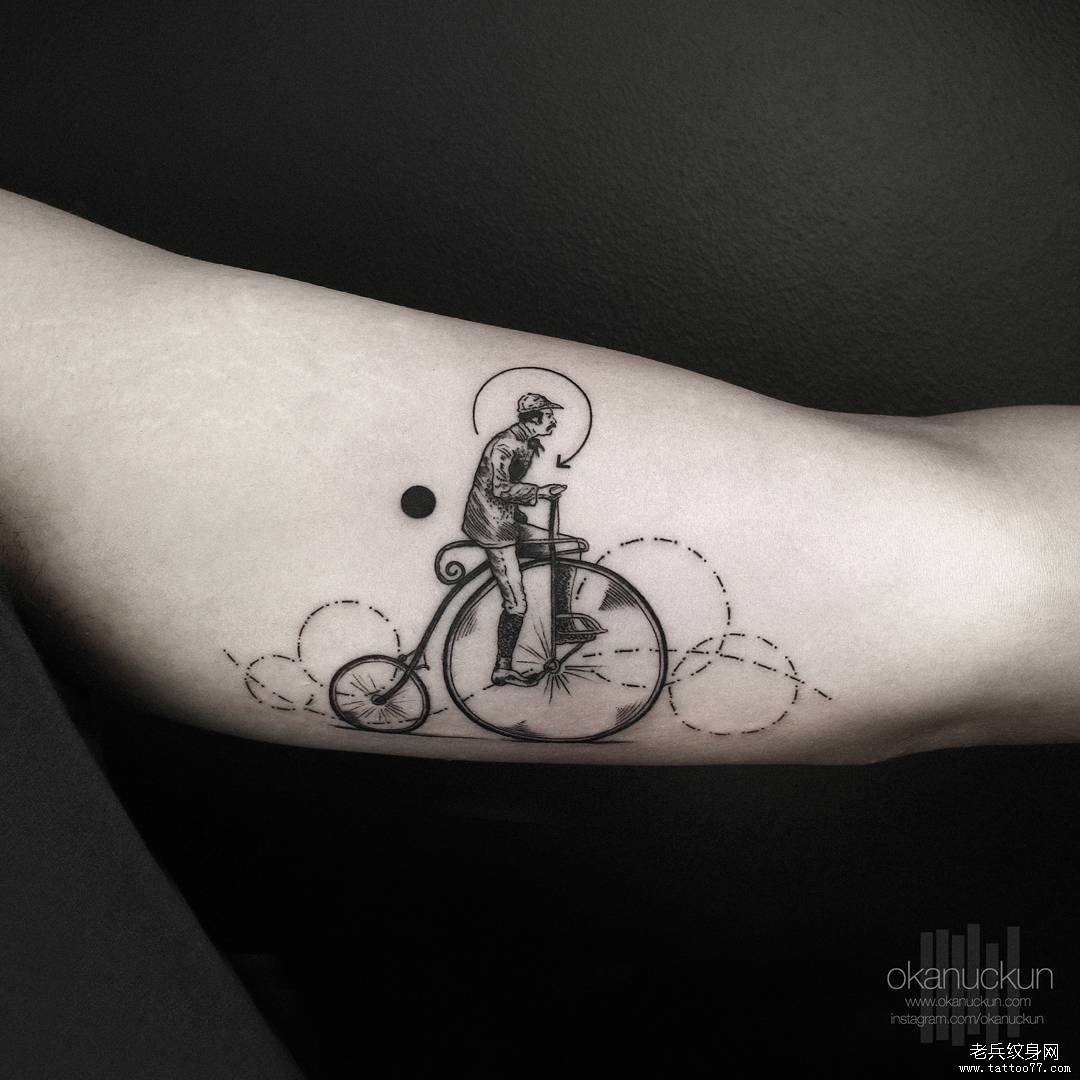 大臂人骑自行车几何线条纹身图案
