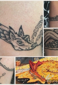 飞龙纹身图 男生小腿上黑色的飞龙纹身图片