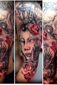 人物肖像纹身  男生手臂上人物肖像和骷髅纹身图片