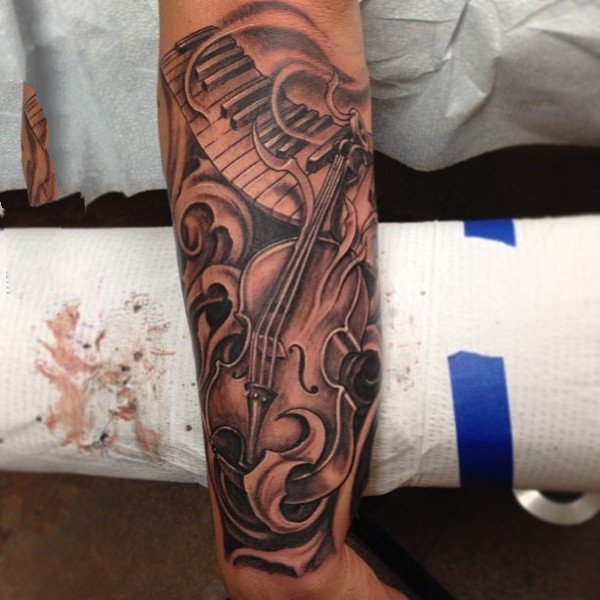 音乐纹身图案  别致而又时尚的音乐纹身图案