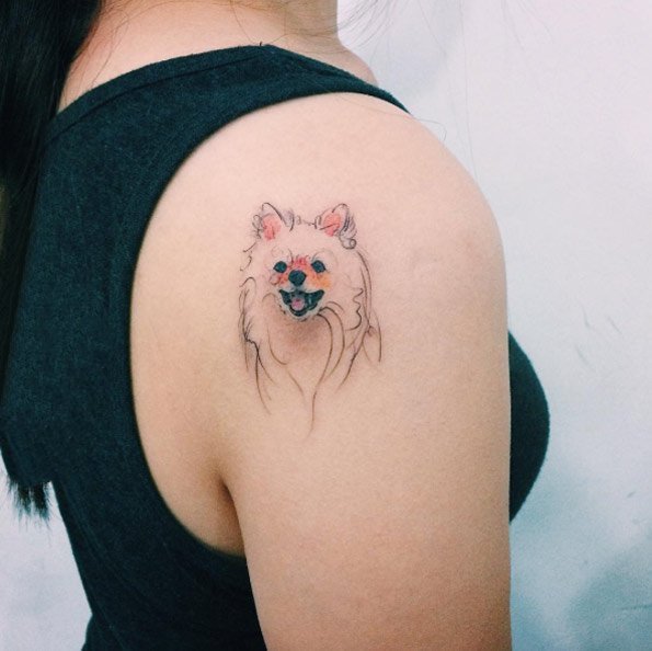 纹身后背  清新而又魅力不凡的后背纹身图案