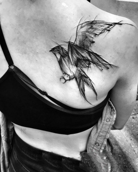 纹身后背  清新而又魅力不凡的后背纹身图案