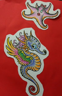 一款潮流时尚的海马与海星纹身图案