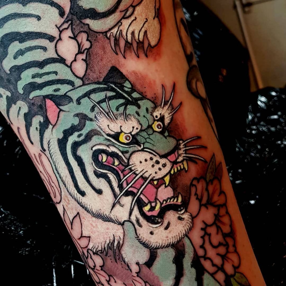 纹身动物   欢蹦乱跳的动物纹身图案