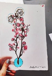 彩绘精美的桃花纹身图案