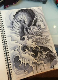 手稿龙浪花纹身图案