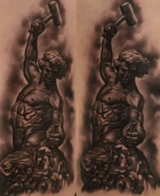 手臂写实耶稣纹身图案