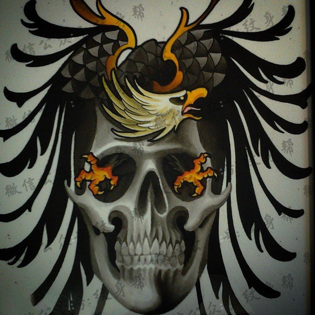 手臂雄鹰骷髅纹身图案