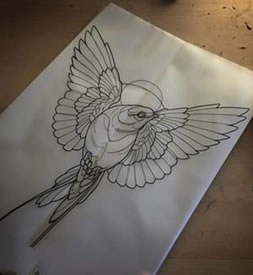 手稿线条的鸟纹身图案