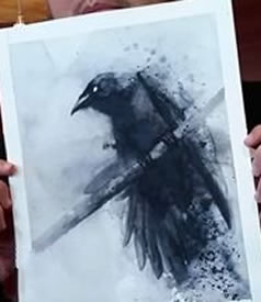 手臂水墨乌鸦纹身图案