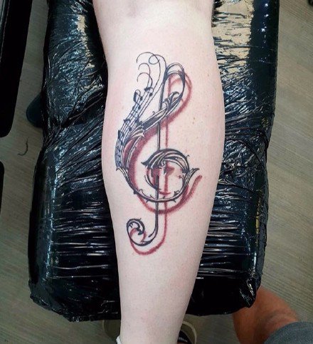 一组和音乐相关的音符乐器等纹身图案欣赏