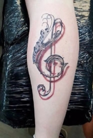一组和音乐相关的音符乐器等纹身图案欣赏