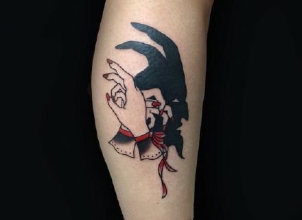 手和影子相组合的创意手影纹身图案图片