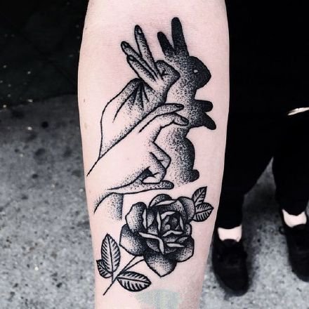 手和影子相组合的创意手影纹身图案图片