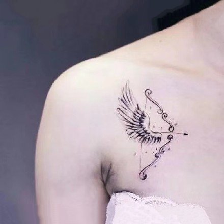 比较小清新的一组花朵弓箭纹身图案