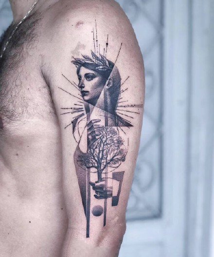 手臂上创意感十足的黑灰纹身作品9张