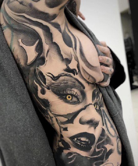 欧美黑灰写实的大面积纹身图案