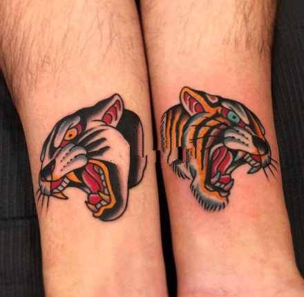 oldschool黄红色调的老虎头纹身图案