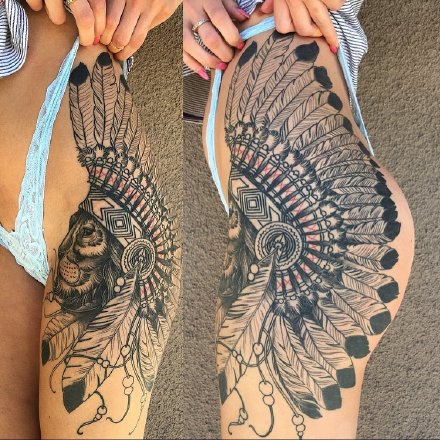 女性大腿侧到臀部的性感纹身图片