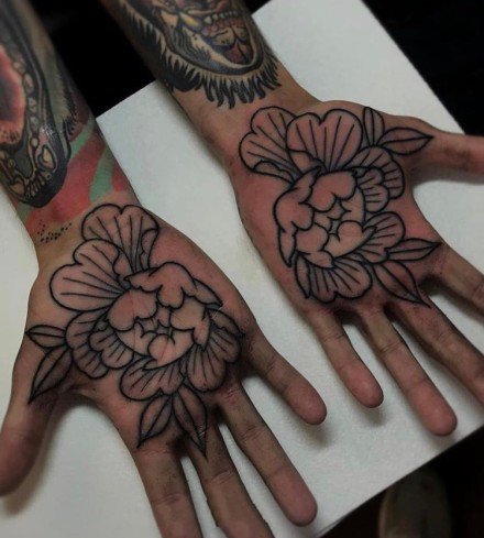 一组手掌心里的创意纹身图案欣赏