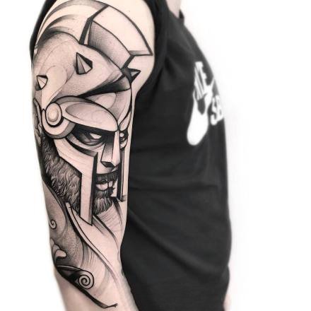 散点手法的包大臂黑灰纹身图案