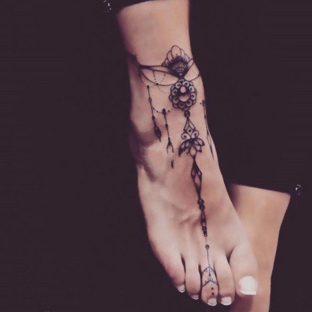 两只脚背上很好看的梵花纹身图案