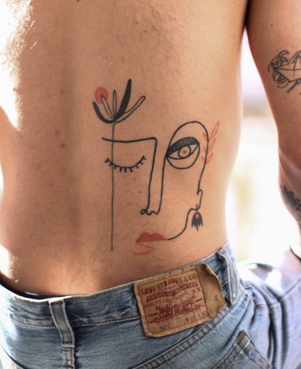 线条组成的涂鸦风格人脸纹身图片