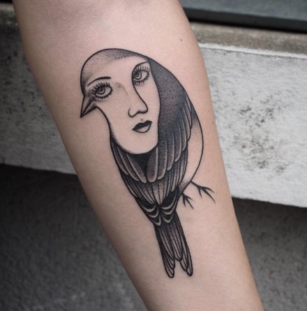 创意的鸟与人脸结合的个性纹身图案