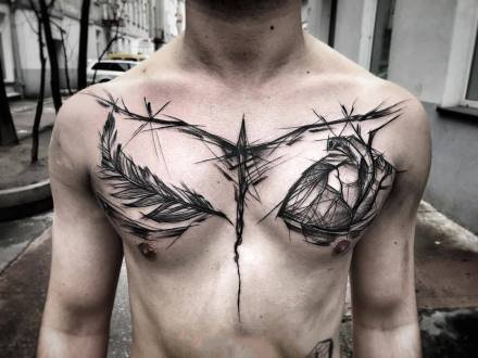 男性帅气的胸前黑色花胸纹身作品