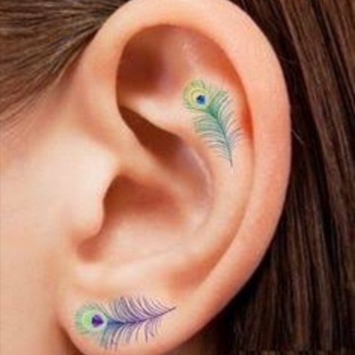 孔雀羽毛纹身 时尚美艳的孔雀羽毛纹身图案