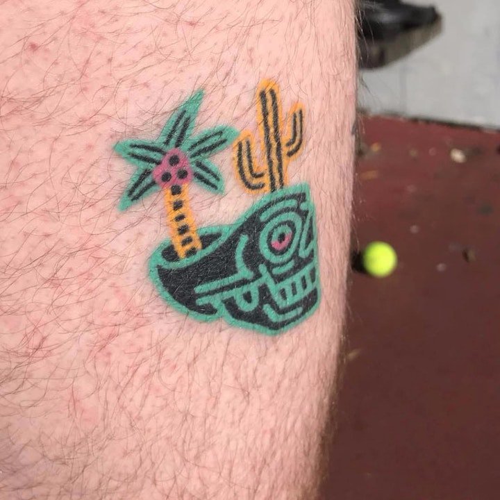 椰树纹身图  生机蓬勃的椰树纹身图案