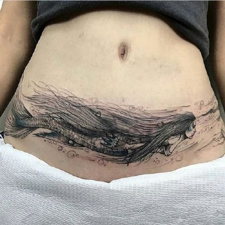 9张女性肚脐眼下的漂亮腹部纹身图案