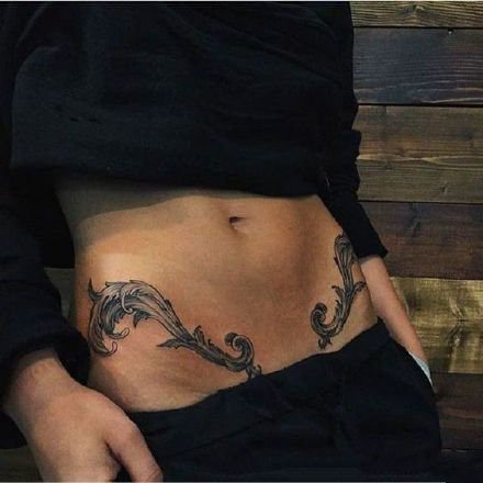 9张女性肚脐眼下的漂亮腹部纹身图案