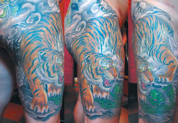 胳膊上的下山虎纹身