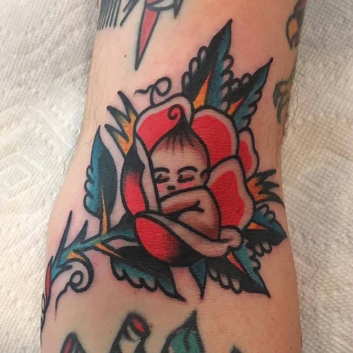 9张oldschool风格的花朵纹身图片