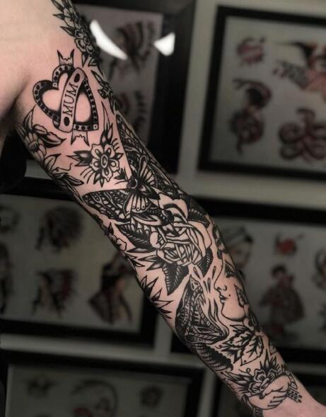 一组手臂上的oldschool风格黑灰纹身图片