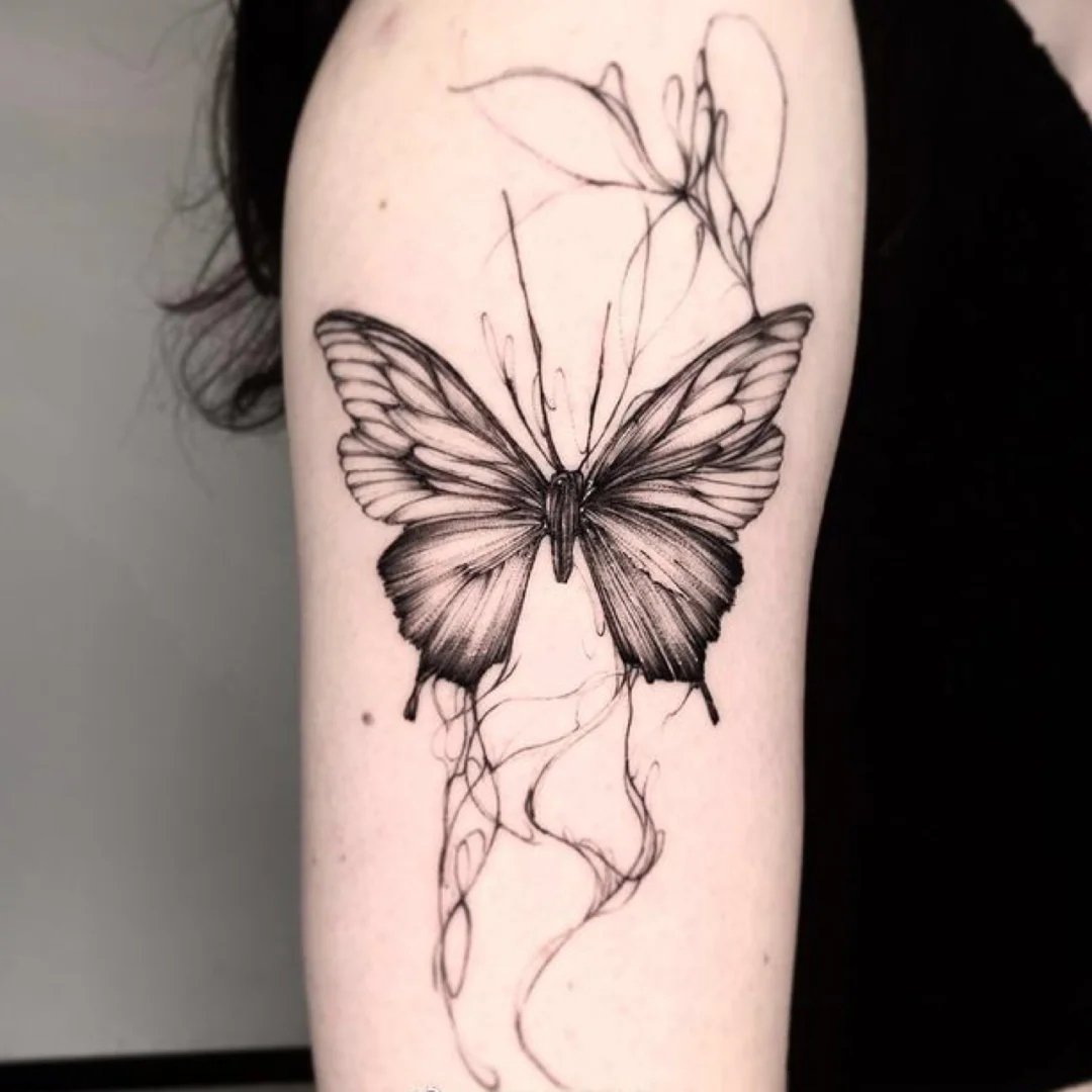 随意泼墨风的9张黑色系纹身图片