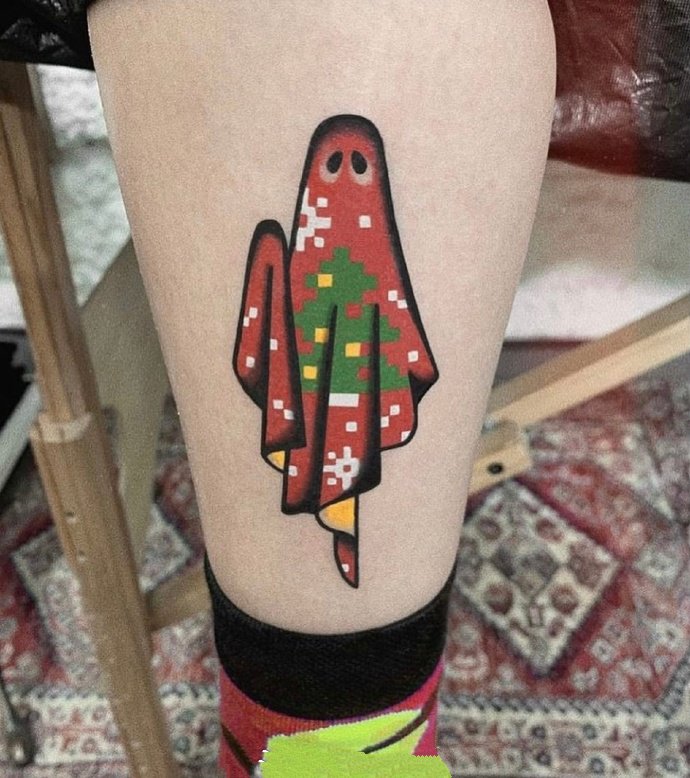 穿着各式花衣裳的小幽灵纹身图片9张