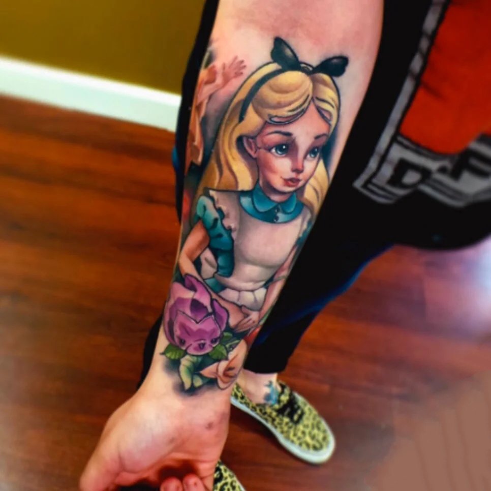 一组卡通的爱丽丝梦游仙境主题纹身图片