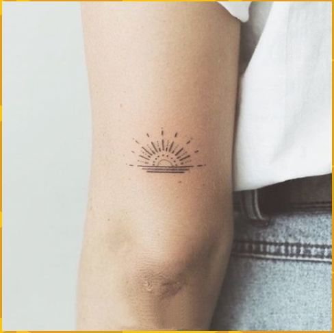 简约小图案的太阳纹身图片9张