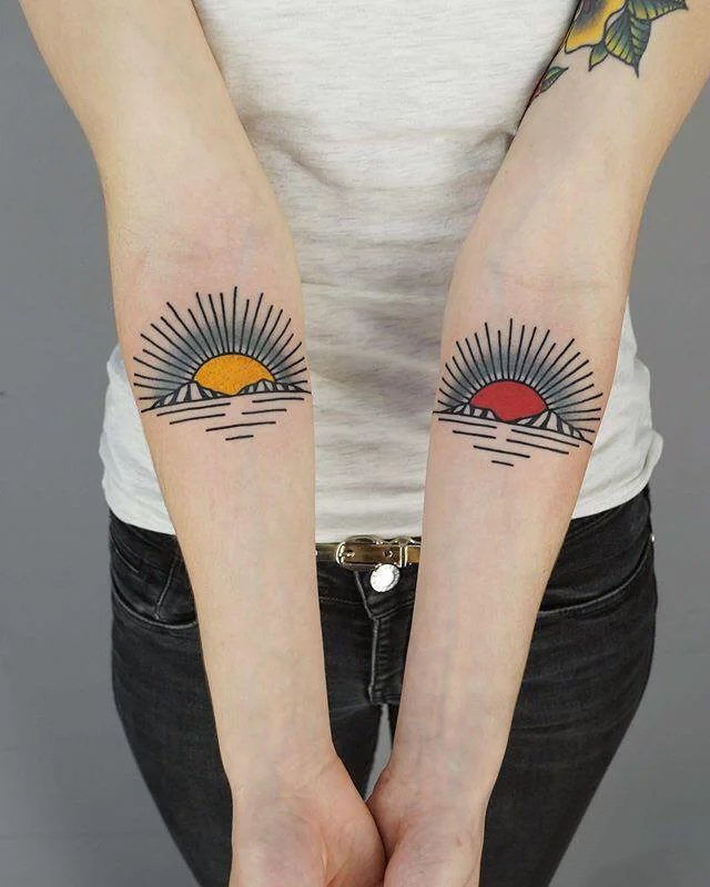 9张彩色的闪耀太阳纹身图片