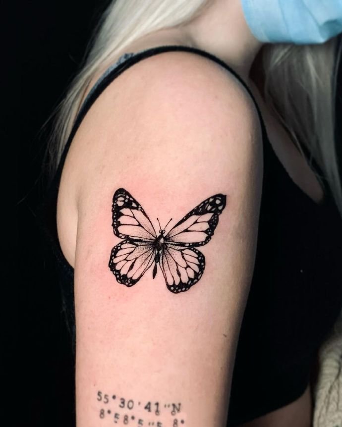 大臂肩膀上的9张卡通纹身图片