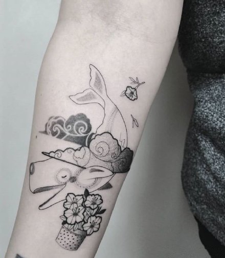 一组孤单的鲸鱼纹身图案欣赏