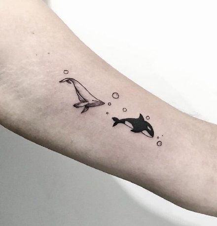 一组孤单的鲸鱼纹身图案欣赏