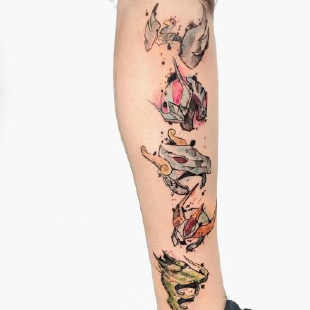 一组彩绘可爱的卡通纹身图案