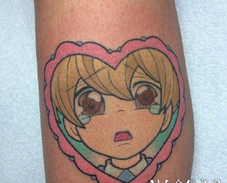 手臂上卡通人物彩绘刺青纹身图案