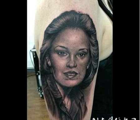 手臂经典人物头像纹身