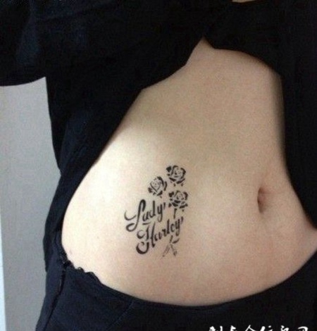 女生美丽腹部花纹图案纹身